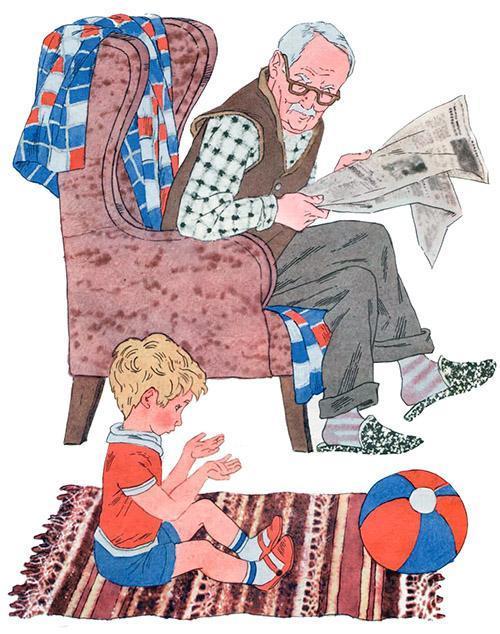 дедушка в кресле с газетой и маленький внук играет